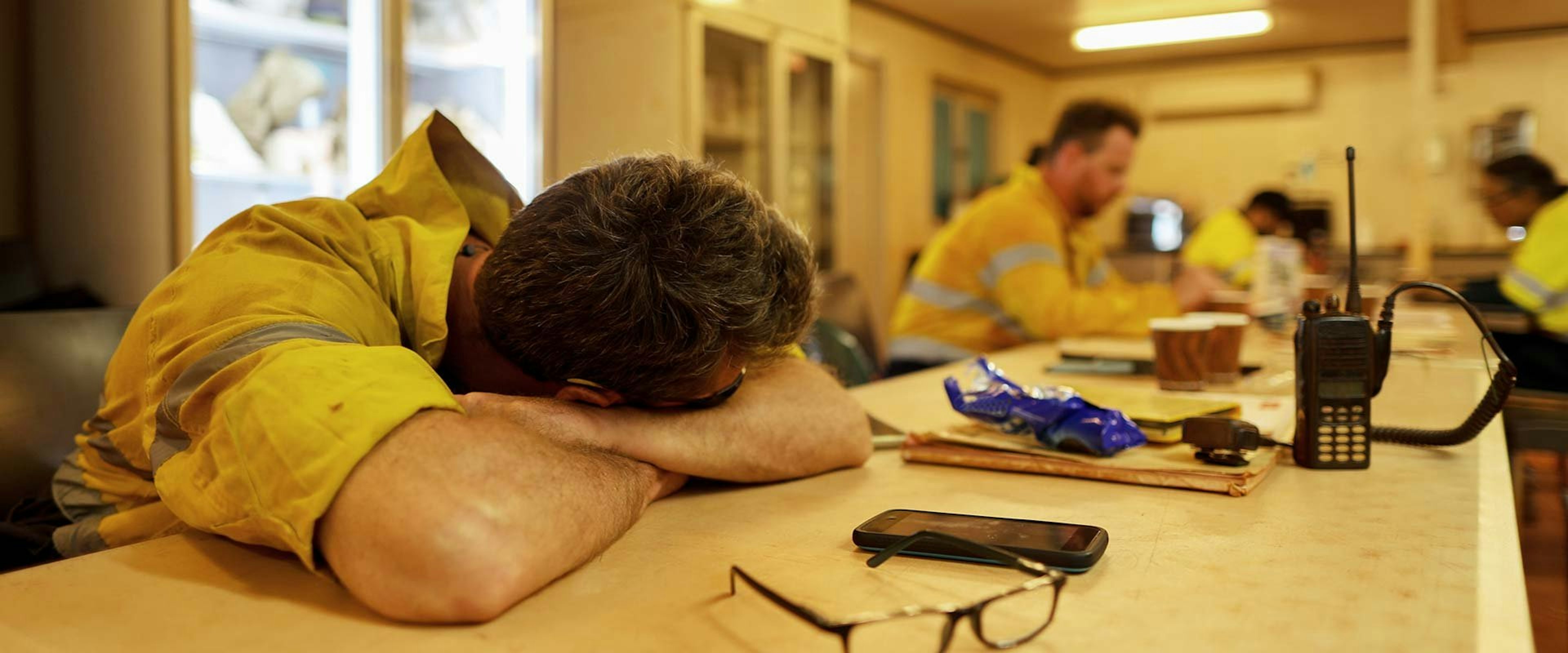 Tired miner resting in break room