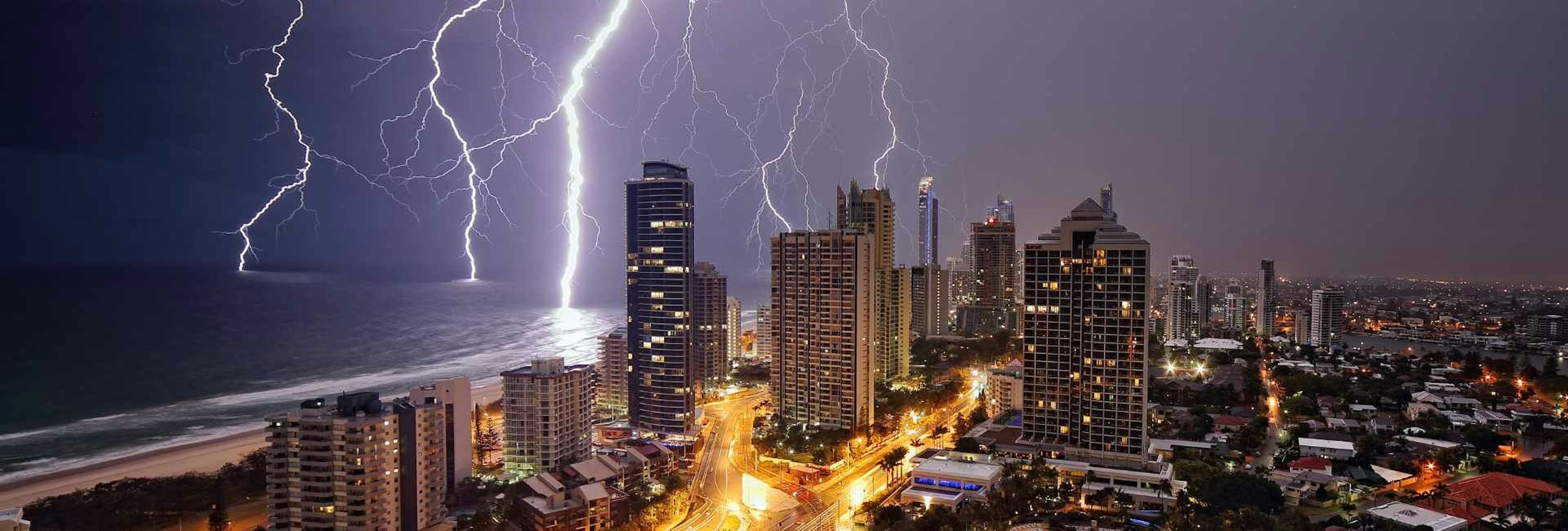 Lighting striking down on high rise buildings at Surfers Paradise, Gold Coast