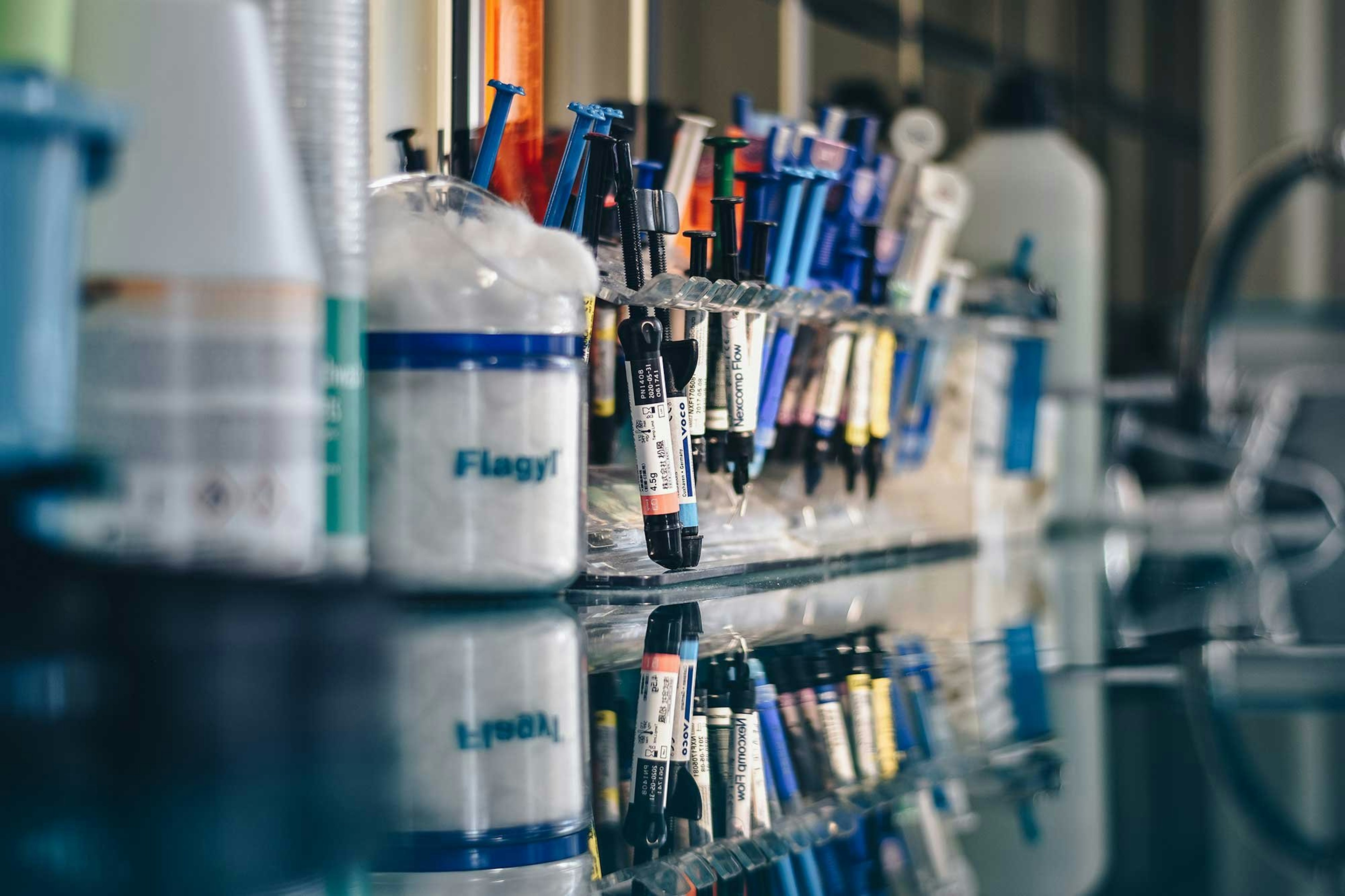 Vials and pipettes on counter